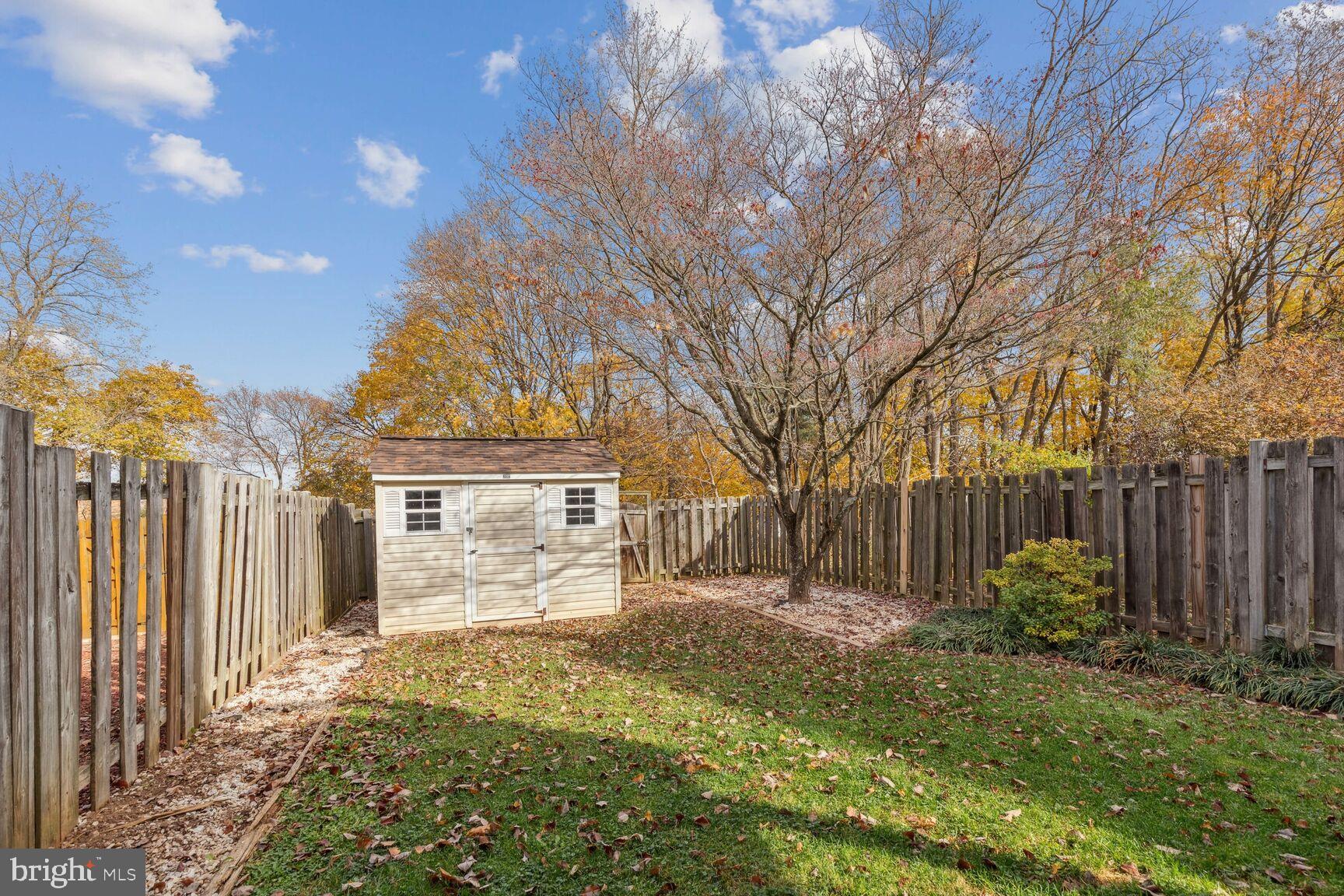 25636 Coltrane Drive Damascus, MD 20872 - Photo 19 of 26 a front view of a house with garden