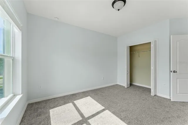 a view of an empty room and window