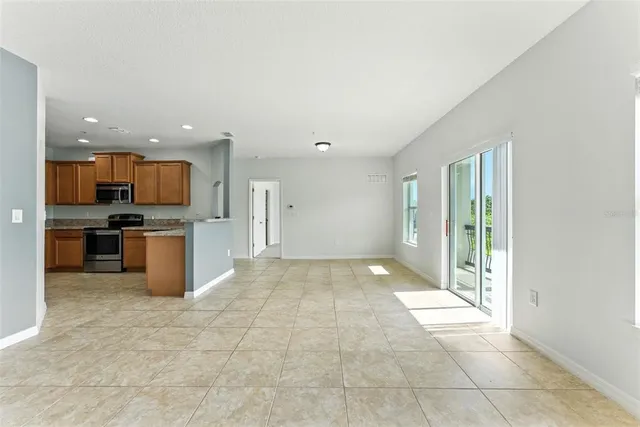 a view of a kitchen with a sink and an oven