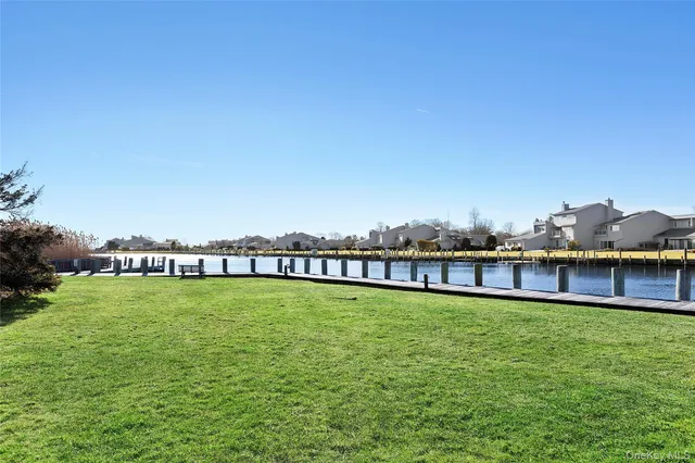 a view of a patio with a city view