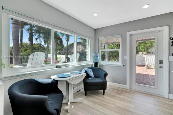 a living room with furniture and a window
