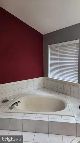 a bathroom with a bathtub