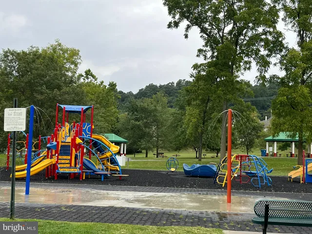 a park with lots of swings and slides
