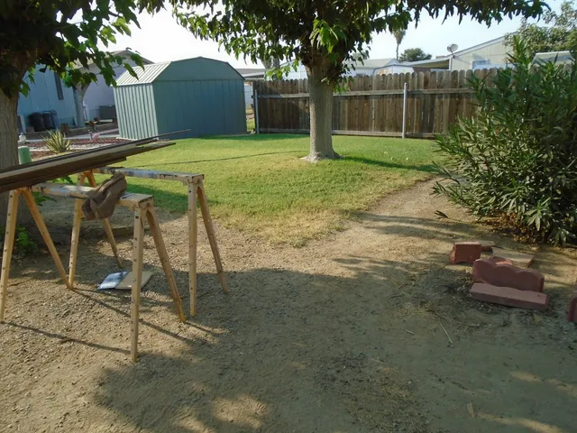 a house view with a garden space