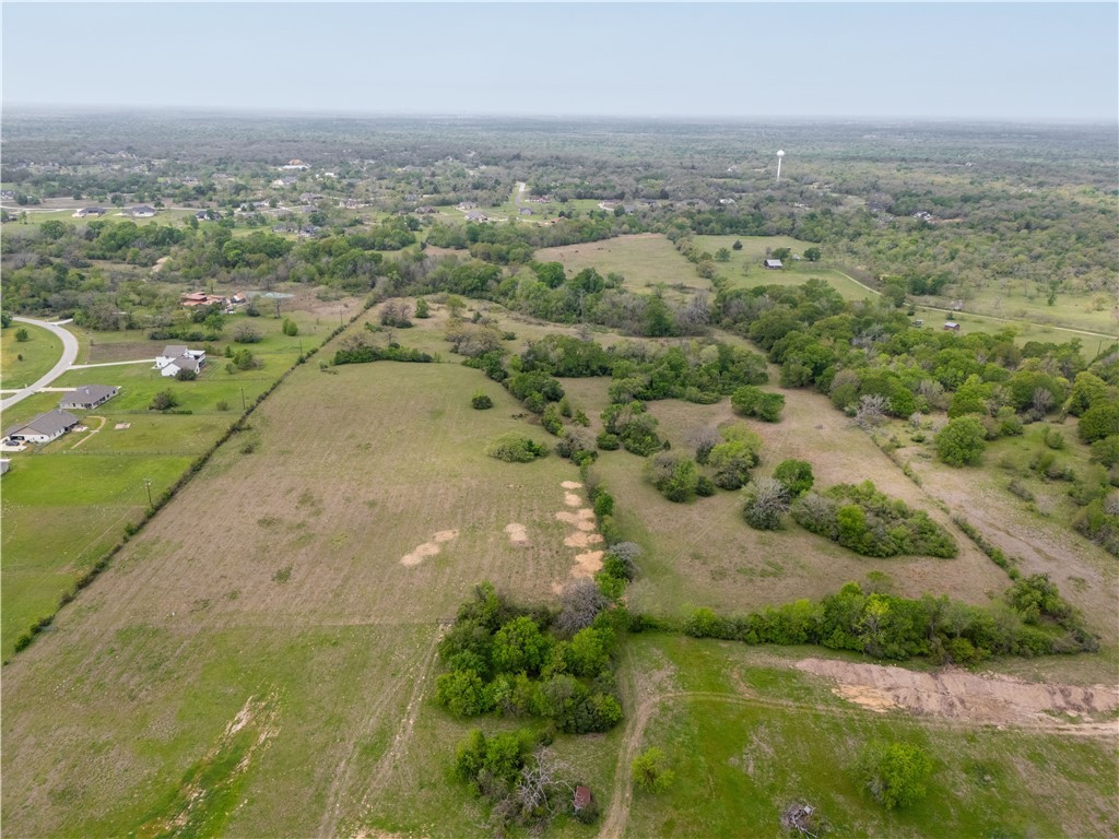 9892 Panther Creek Road Iola, TX 77861 - Photo 3 of 50 an aerial view of a city with lots of residential buildings