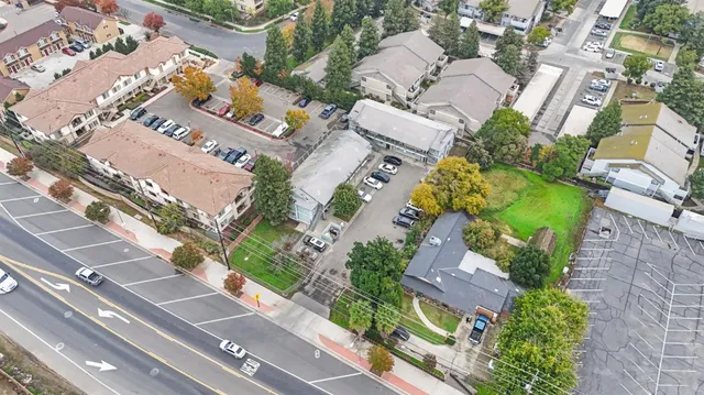 an aerial view of residential house with outdoor space