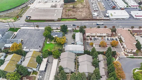 an aerial view of a building with outdoor space