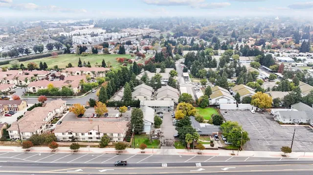 an aerial view of a city with lots of residential buildings