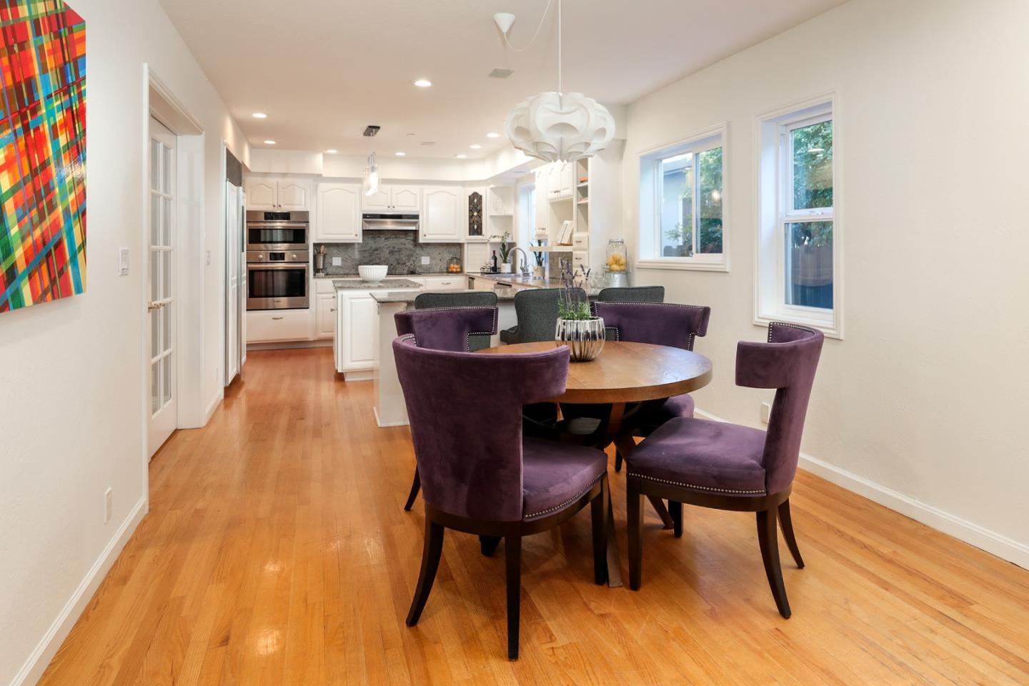 1314 Cloud Avenue Menlo Park, CA 94025 - Photo 11 of 31 a dining room with a wooden table and chairs