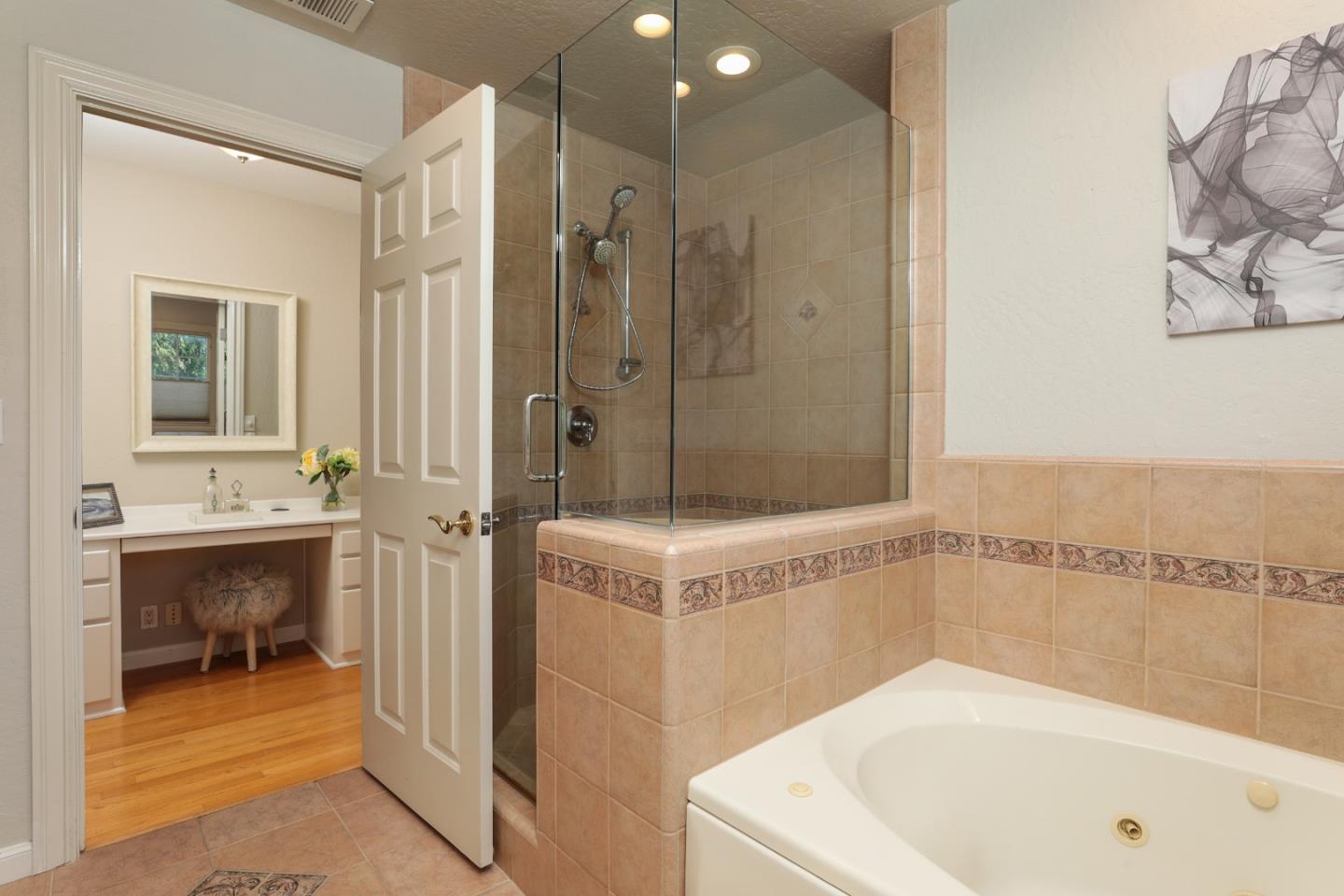1314 Cloud Avenue Menlo Park, CA 94025 - Photo 17 of 31 a bathroom with a tub a sink and a mirror