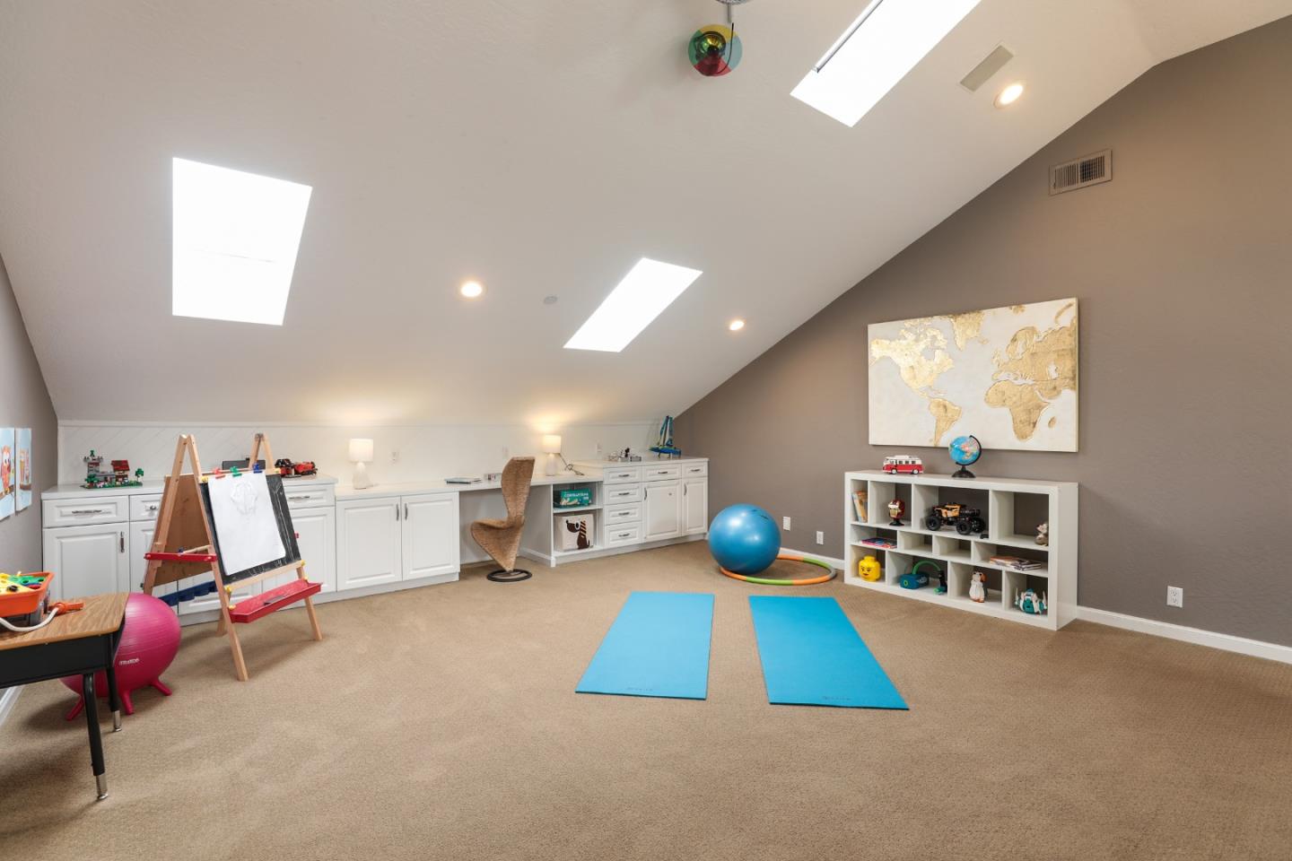 1314 Cloud Avenue Menlo Park, CA 94025 - Photo 18 of 31 a room with gym equipment and a window