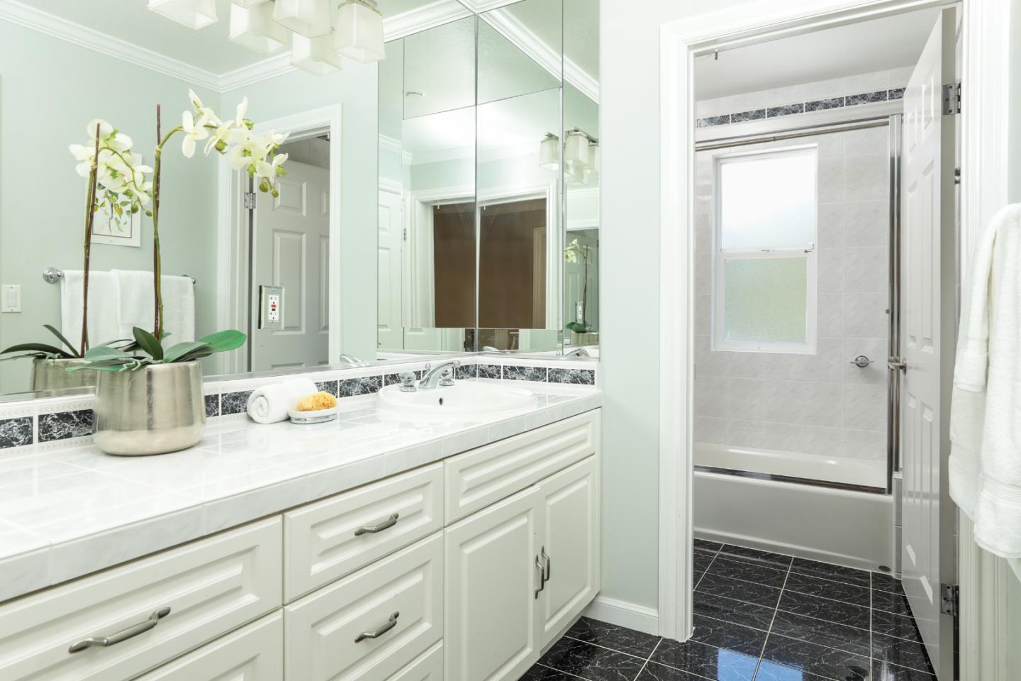 1314 Cloud Avenue Menlo Park, CA 94025 - Photo 20 of 31 a bathroom with a double vanity sink mirror and shower