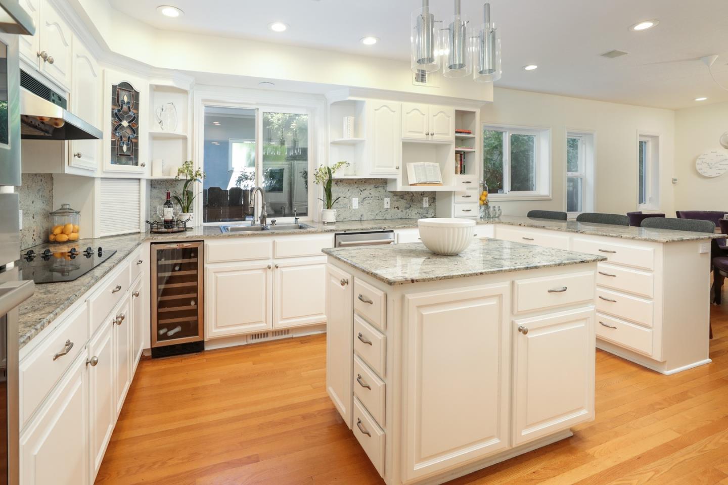 1314 Cloud Avenue Menlo Park, CA 94025 - Photo 9 of 31 a kitchen with granite countertop white cabinets and white appliances