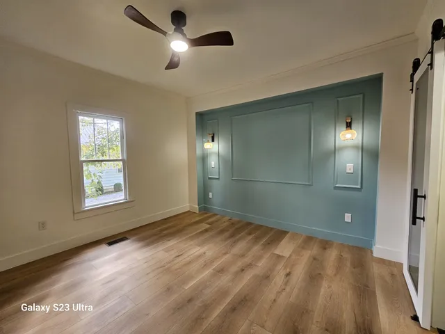 a view of an empty room and window