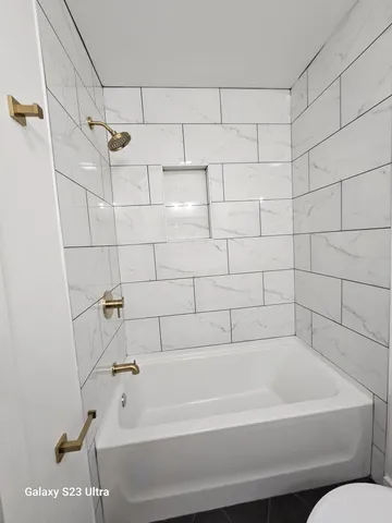 a bathroom with a bathtub