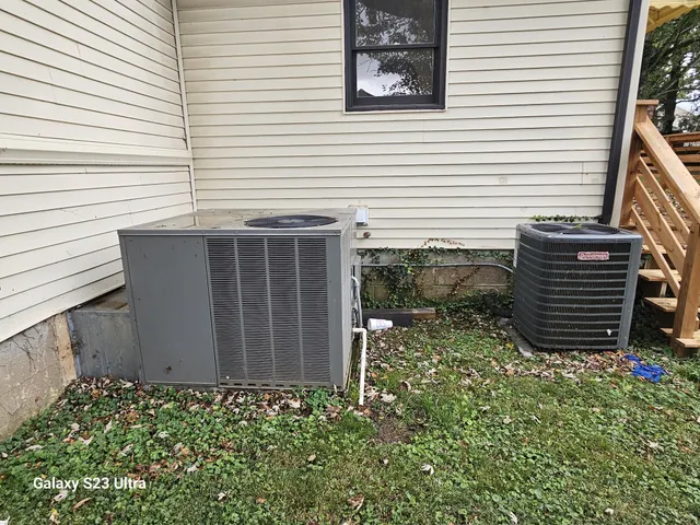a view of house with wooden fence
