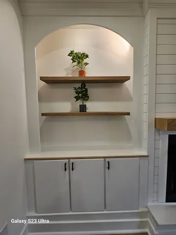 a view of small living room with hallway