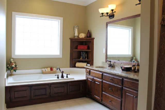 128 Hunters Ridge Drive Tullahoma, TN 37388 - Photo 13 of 20 The Master Bathroom is Spacious and features Double Sinks and a seperate Tub and Shower.