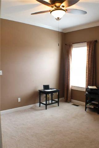 128 Hunters Ridge Drive Tullahoma, TN 37388 - Photo 19 of 20 This Bedroom is uniquely positioned between both hallways and is a great Office or addition space if not needed for a Bedroom.
