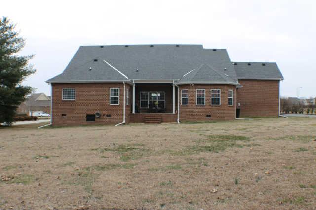 128 Hunters Ridge Drive Tullahoma, TN 37388 - Photo 20 of 20 This Home has a large back yard with lots of privacy and a great covered patio with an entry door to the Kitchen/Hearth Area.