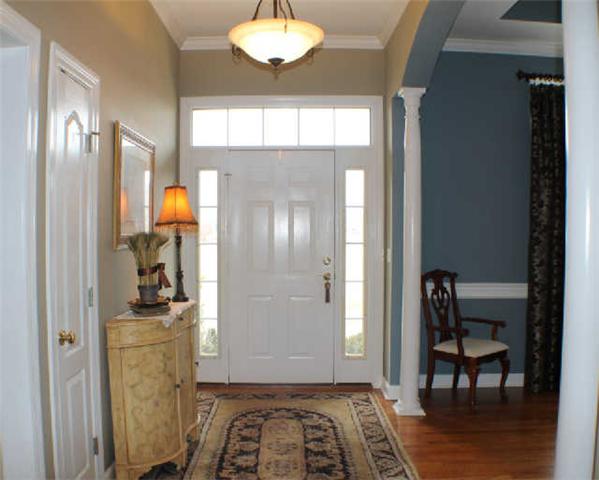 128 Hunters Ridge Drive Tullahoma, TN 37388 - Photo 2 of 20 Step inside the entry foyer and notice this large rooms and soaring ceilings.