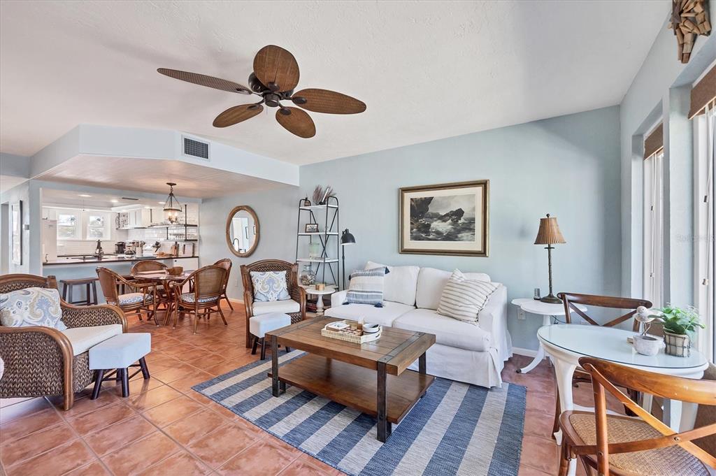 530 5th Street West, Unit 4 Boca Grande, FL 33921 - Photo 17 of 48 a living room with furniture and a large window