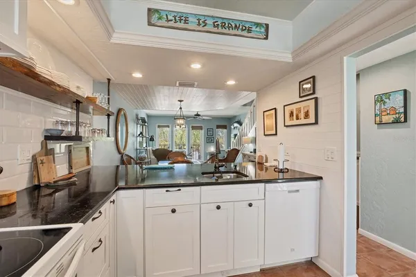 a dining room with a table and chairs