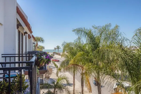 a bathroom with a toilet a sink and a mirror