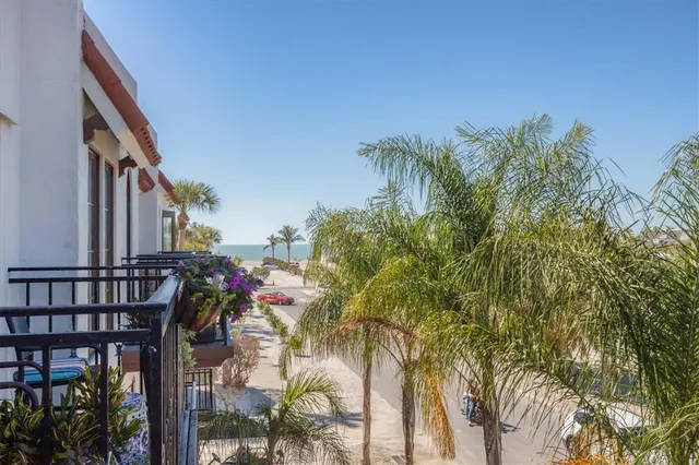 a bathroom with a toilet a sink and a mirror