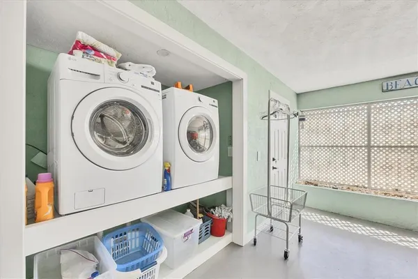 a view of balcony with furniture
