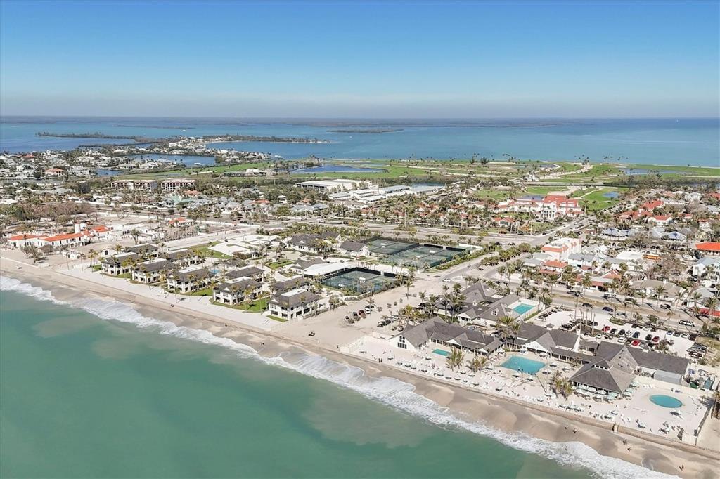 530 5th Street West, Unit 4 Boca Grande, FL 33921 - Photo 41 of 48 an aerial view of ocean and residential houses with outdoor space