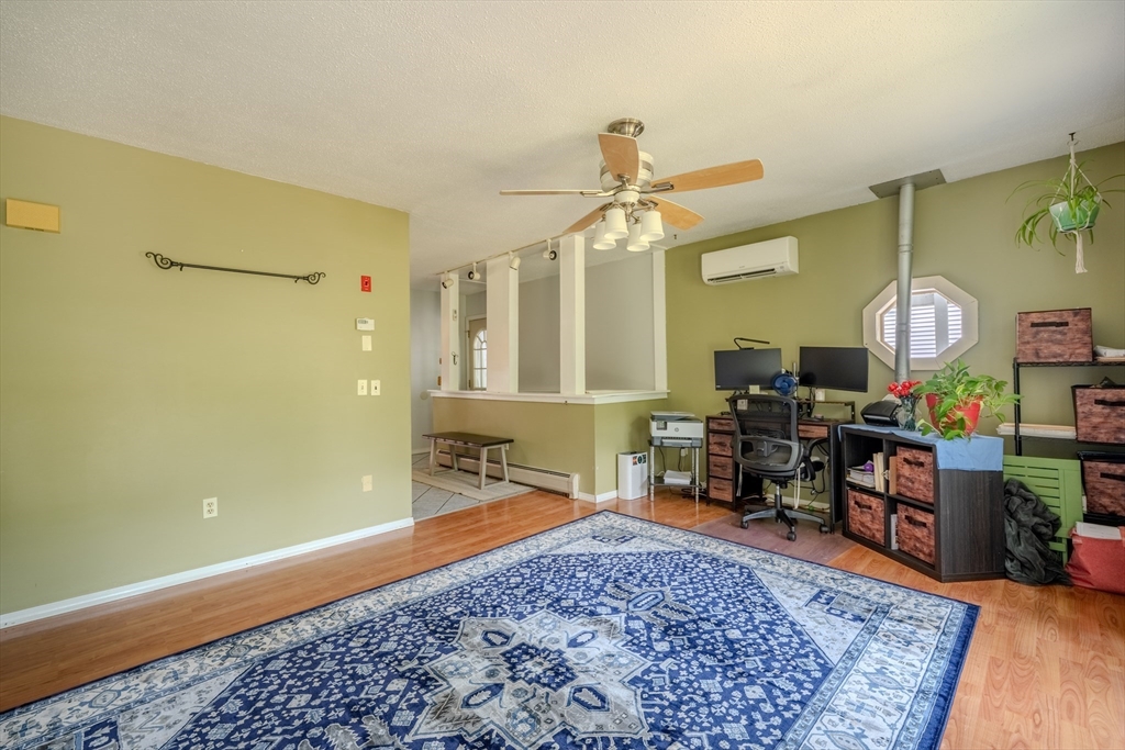 71 Webber Road Brookfield, MA 01506 - Photo 11 of 41 a living room with furniture and wooden floor