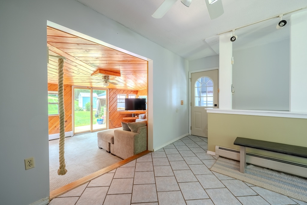 71 Webber Road Brookfield, MA 01506 - Photo 16 of 41 a lobby with furniture and floor to ceiling window