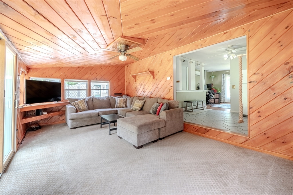 71 Webber Road Brookfield, MA 01506 - Photo 17 of 41 a living room with furniture and a flat screen tv