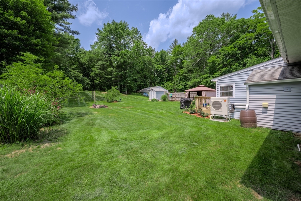 71 Webber Road Brookfield, MA 01506 - Photo 2 of 41 a view of a backyard with sitting area