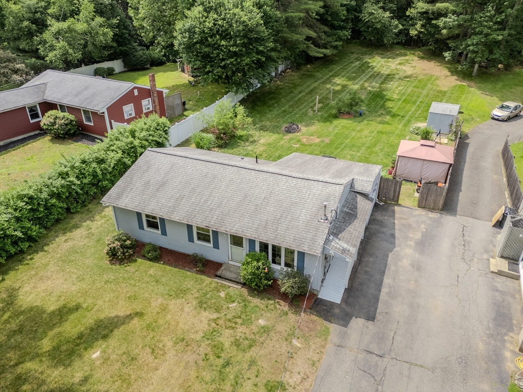 71 Webber Road Brookfield, MA 01506 - Photo 30 of 41 an aerial view of a house with pool a yard and lake view