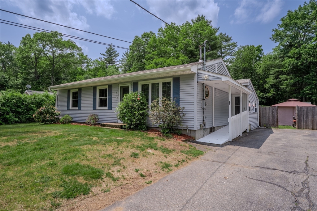 71 Webber Road Brookfield, MA 01506 - Photo 34 of 41 a view of a house with a yard and potted plants