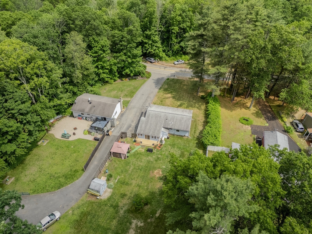 71 Webber Road Brookfield, MA 01506 - Photo 39 of 41 an aerial view of a house with garden space and street view