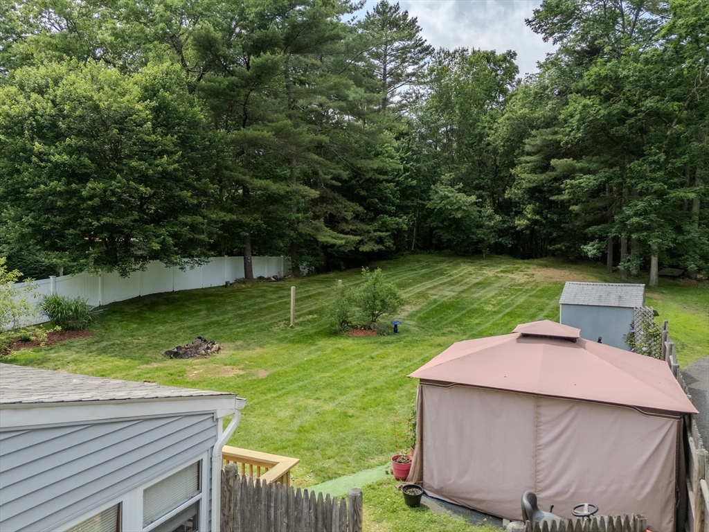 71 Webber Road Brookfield, MA 01506 - Photo 7 of 41 a view of a garden with lawn chairs