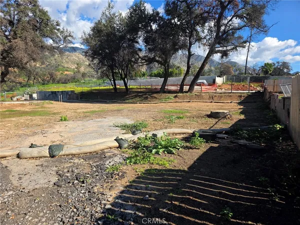 a view of a yard with an outdoor space
