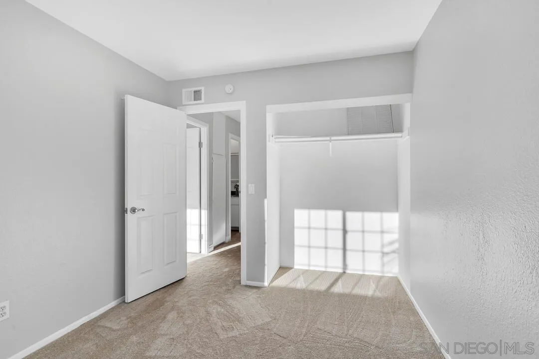 9651 Ramsgate Way Santee, CA 92071 - Photo 35 of 52 a view of an empty room with a window