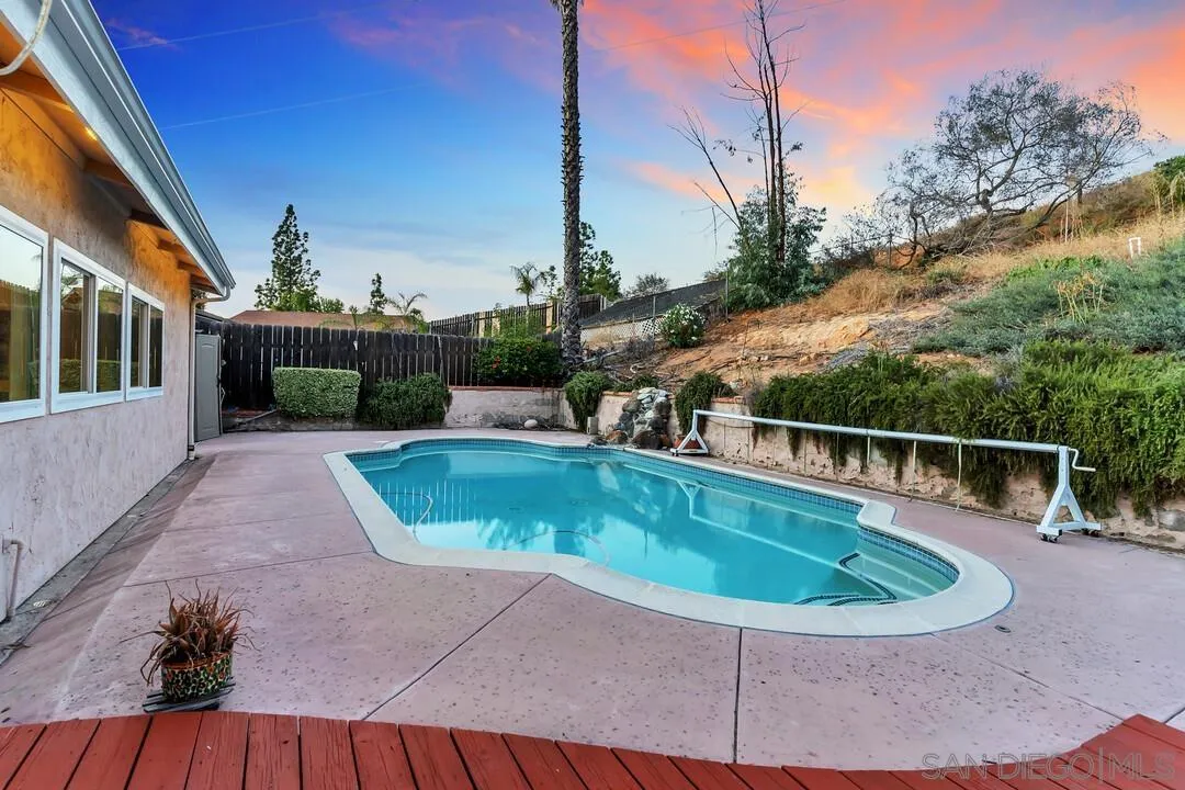 9651 Ramsgate Way Santee, CA 92071 - Photo 47 of 52 a view of a swimming pool with a patio