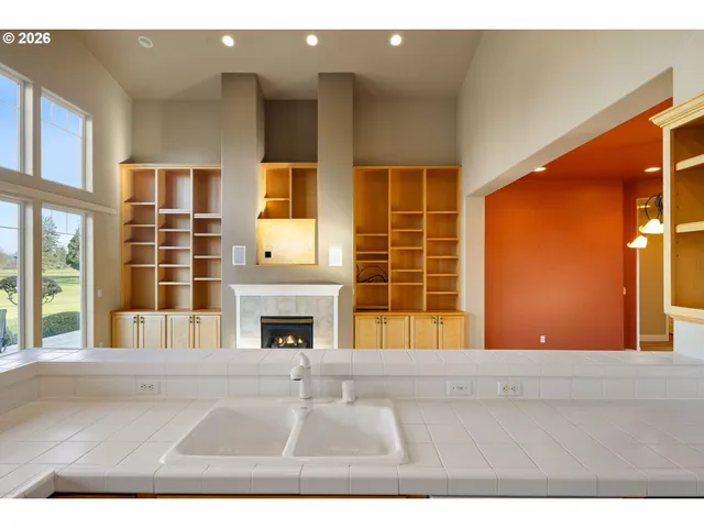 a front view of a house with large windows