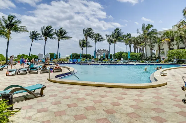 a view of gallery with a mirror