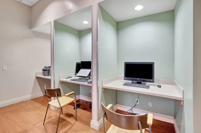a view of a dining room with furniture window and outdoor view