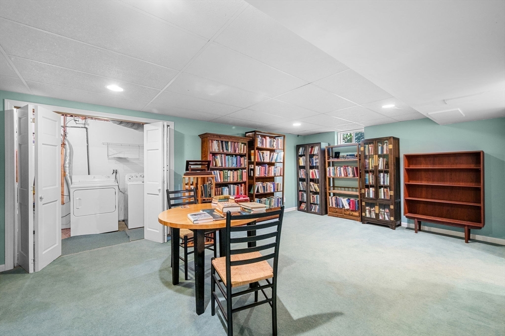 33 Pleasant Street, Unit 33 Manchester, MA 01944 - Photo 30 of 40 a room with furniture and gym equipment