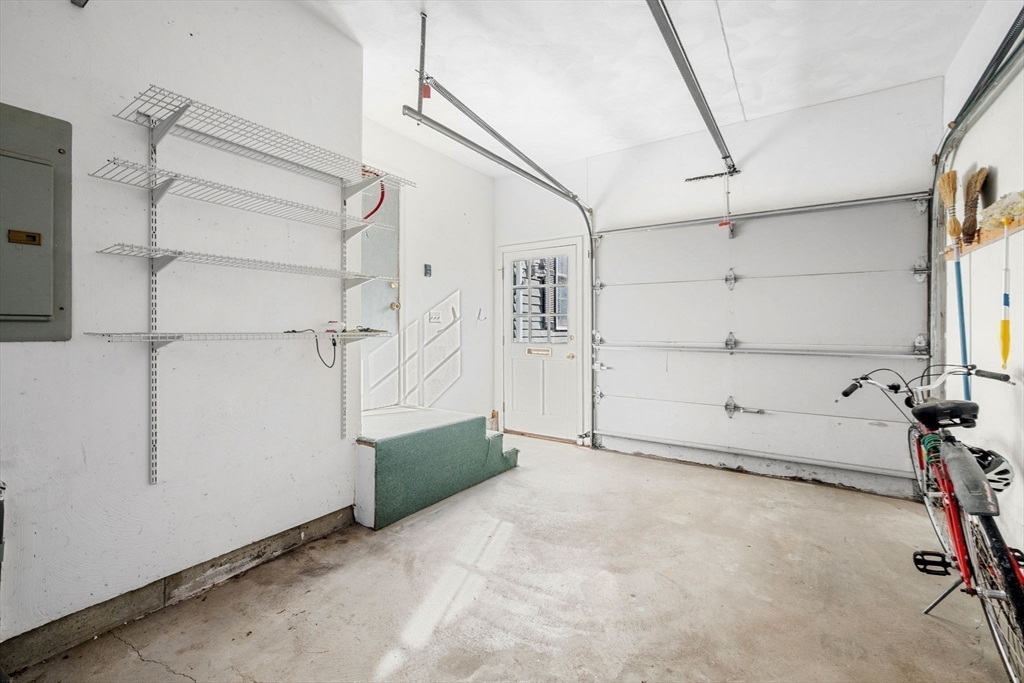 33 Pleasant Street, Unit 33 Manchester, MA 01944 - Photo 35 of 40 a view of walk in closet with empty racks