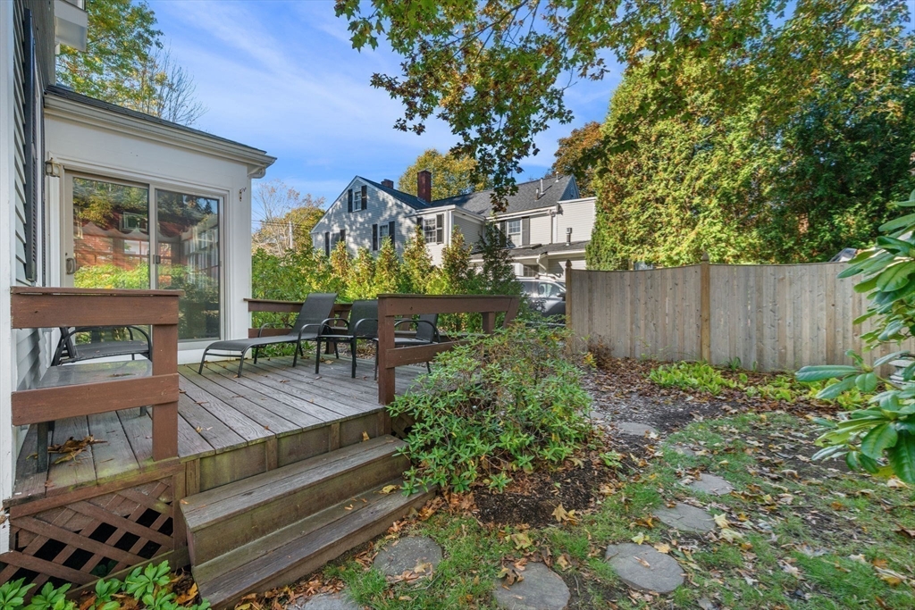 33 Pleasant Street, Unit 33 Manchester, MA 01944 - Photo 37 of 40 a view of a house with a patio