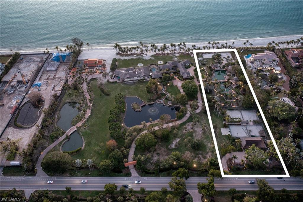 2170 Gordon Drive Naples, FL 34102 - Photo 2 of 2 an aerial view of multiple houses with outdoor space