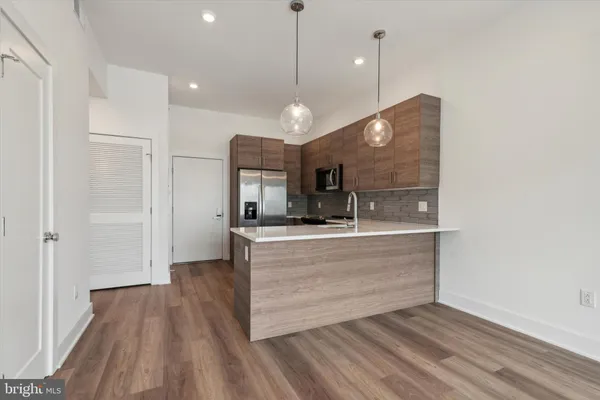 a view of kitchen and kitchen island